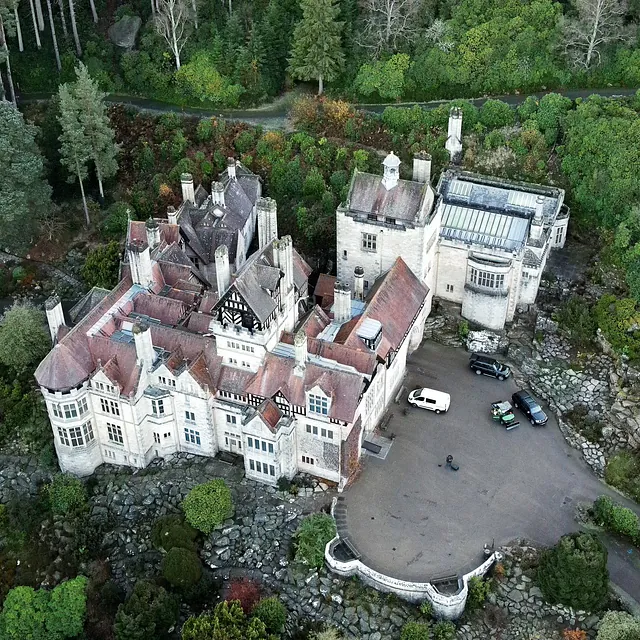 Drone surveying mansion grounds